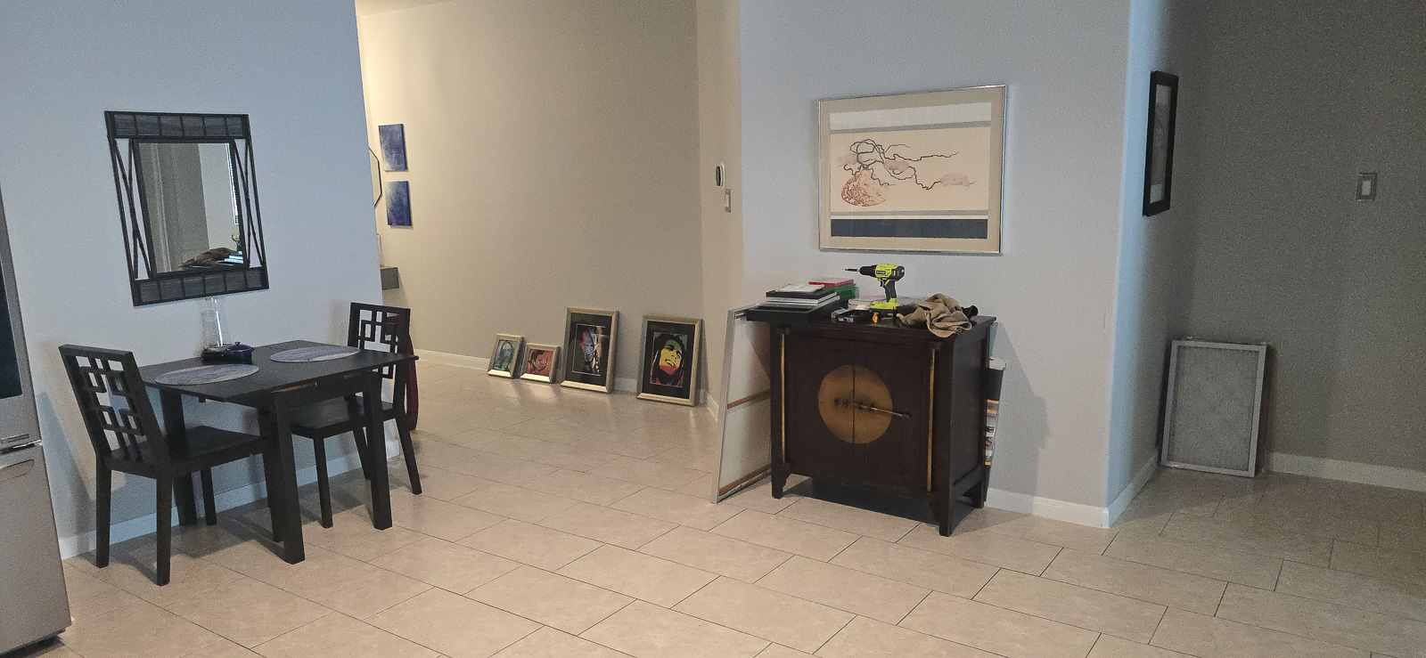 Dining nook with agate placemats and geometric chairs